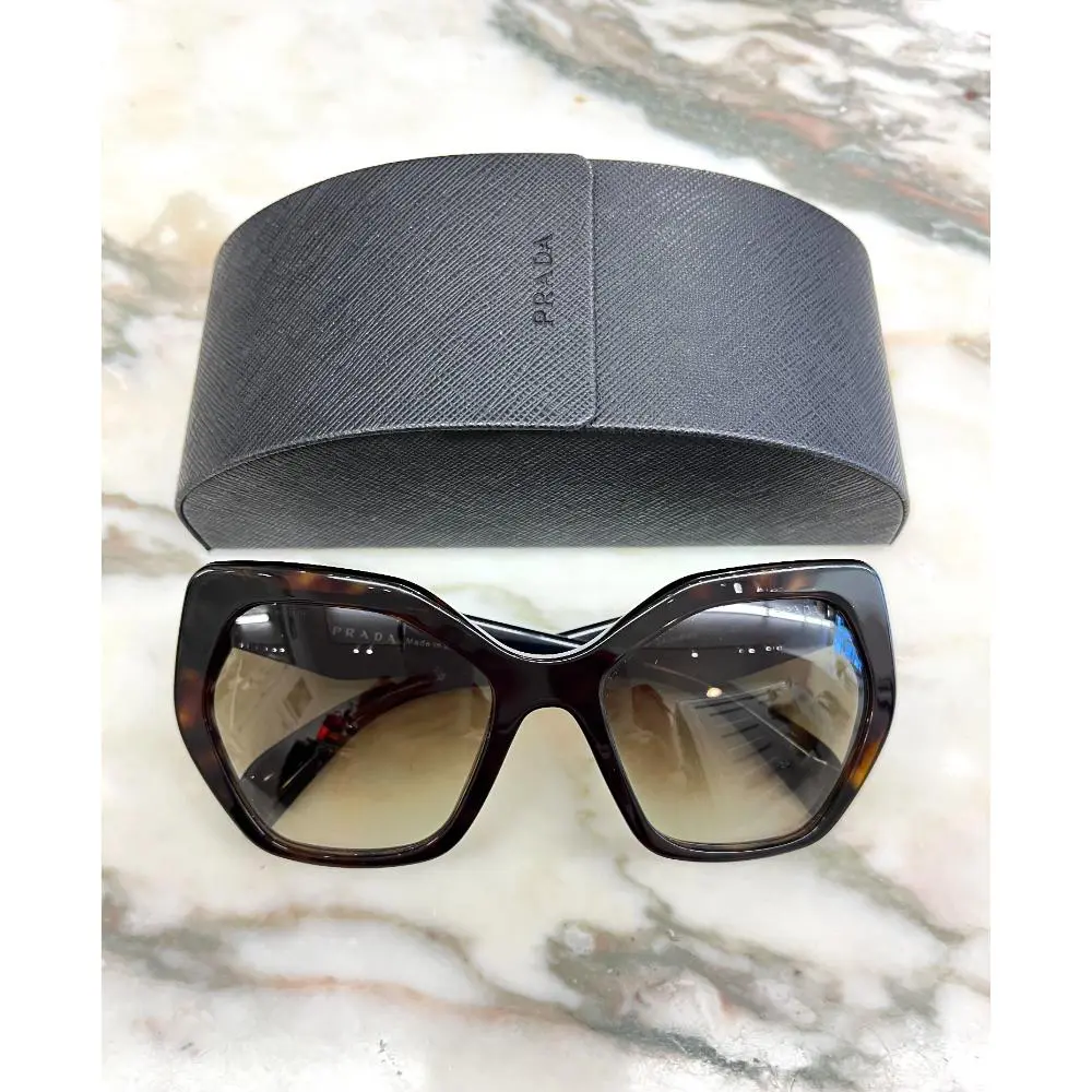 Prada SPR 16R sunglasses with gradient lenses