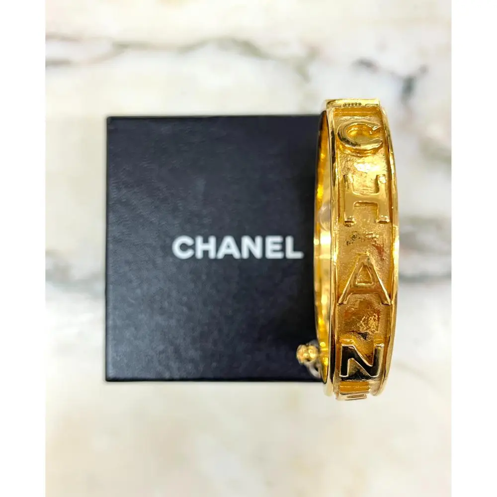 Chanel gold logo bangle bracelet