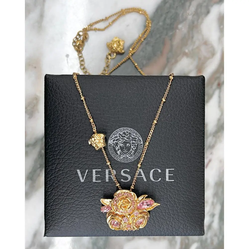 Versace gold chain necklace w/ rose and medusa charms