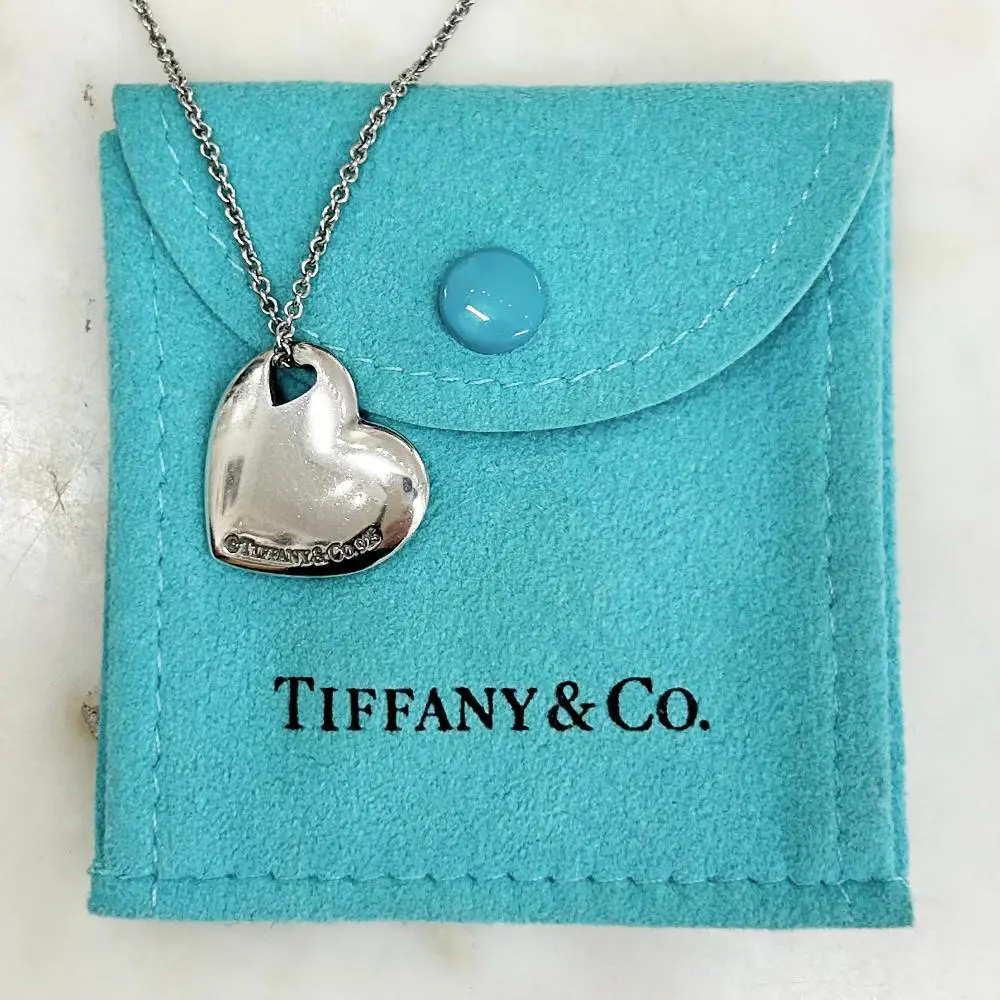 Tiffany & Co. solid silver heart cut out pendent necklace